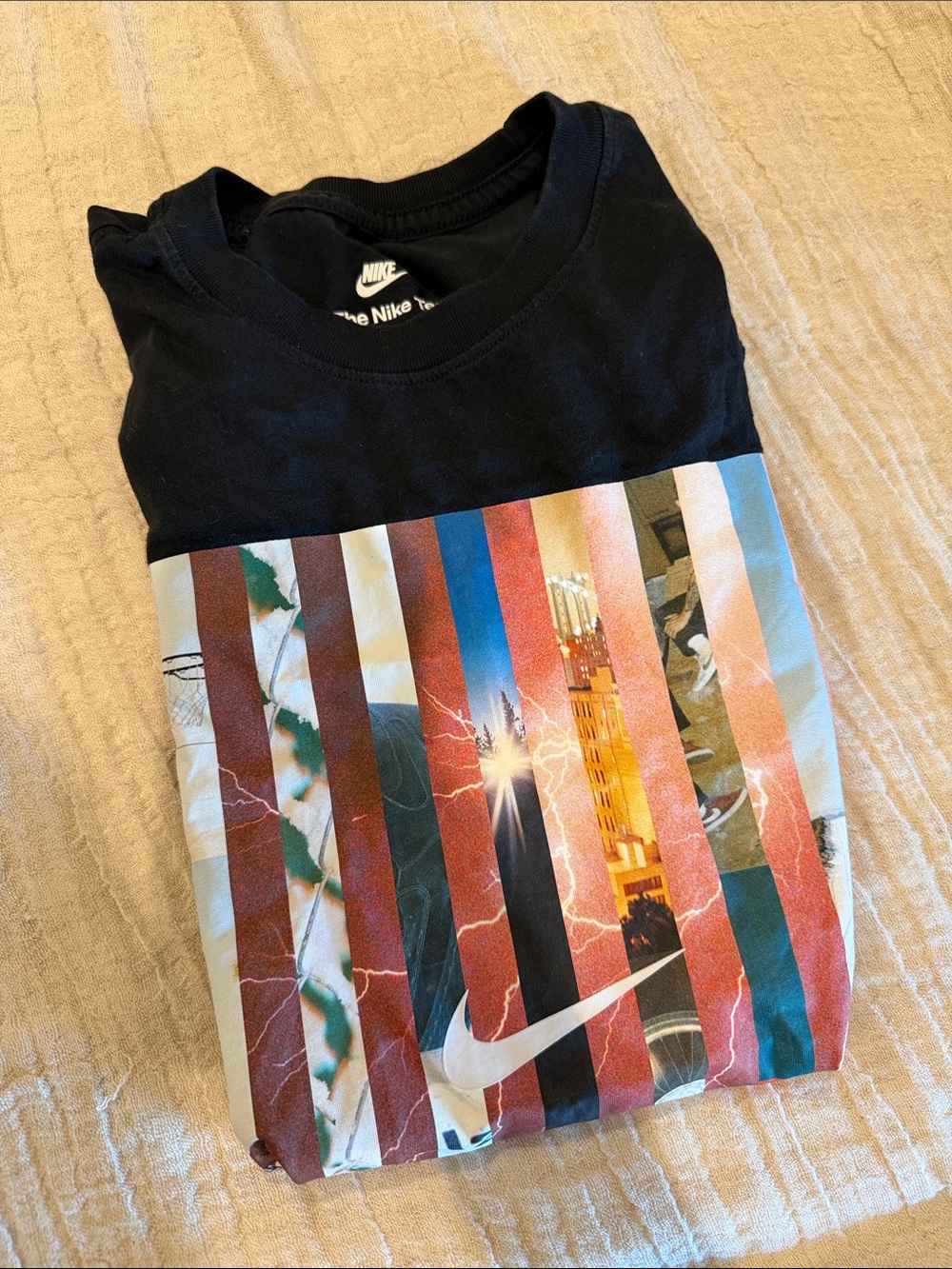 Nike Kids Black Tee with Multicolor Striped Graphic and White Swoosh